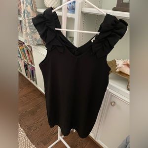 Black Dress with Ruffles on the Shoulders